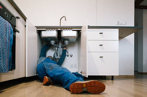 Professional Plumbing technician working in Middle Island, NY